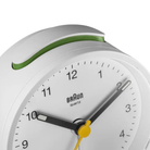 The white BC12 Round Alarm Clock by Braun from a top close-up.