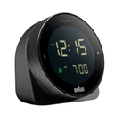 The black BC24 Alarm Clock by Braun from a side angle.