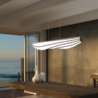 The Lenis Linear Pendant from Cerno in walnut in a workspace.