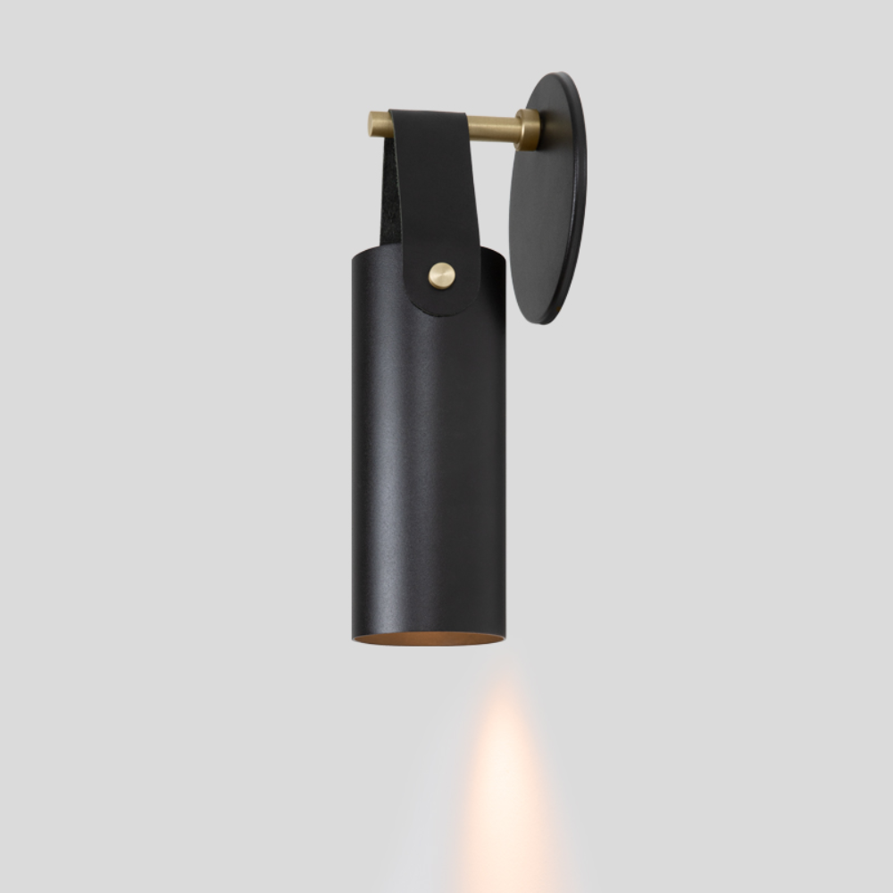 The black Spero Wall Sconce from Cerno from the side.