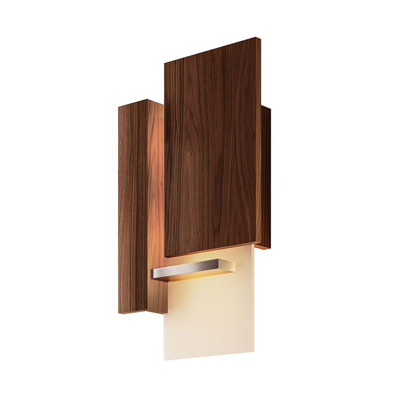 The Vesper Wall Sconce from Cerno in oiled walnut at an angle.
