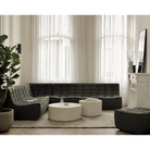 N701 Large sofa configuration with square corner by ethnicraft in moss eco upholstery in a living room