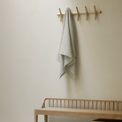 The sycamore PI Wall Coat Rack Oak by Ethnicraft in the living room.