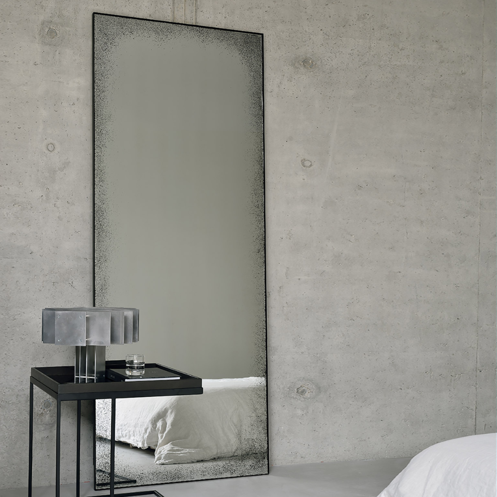 The Aged Wall Mirror Rectangle, clear 78.5 inches from Ethnicraft in a bedroom.