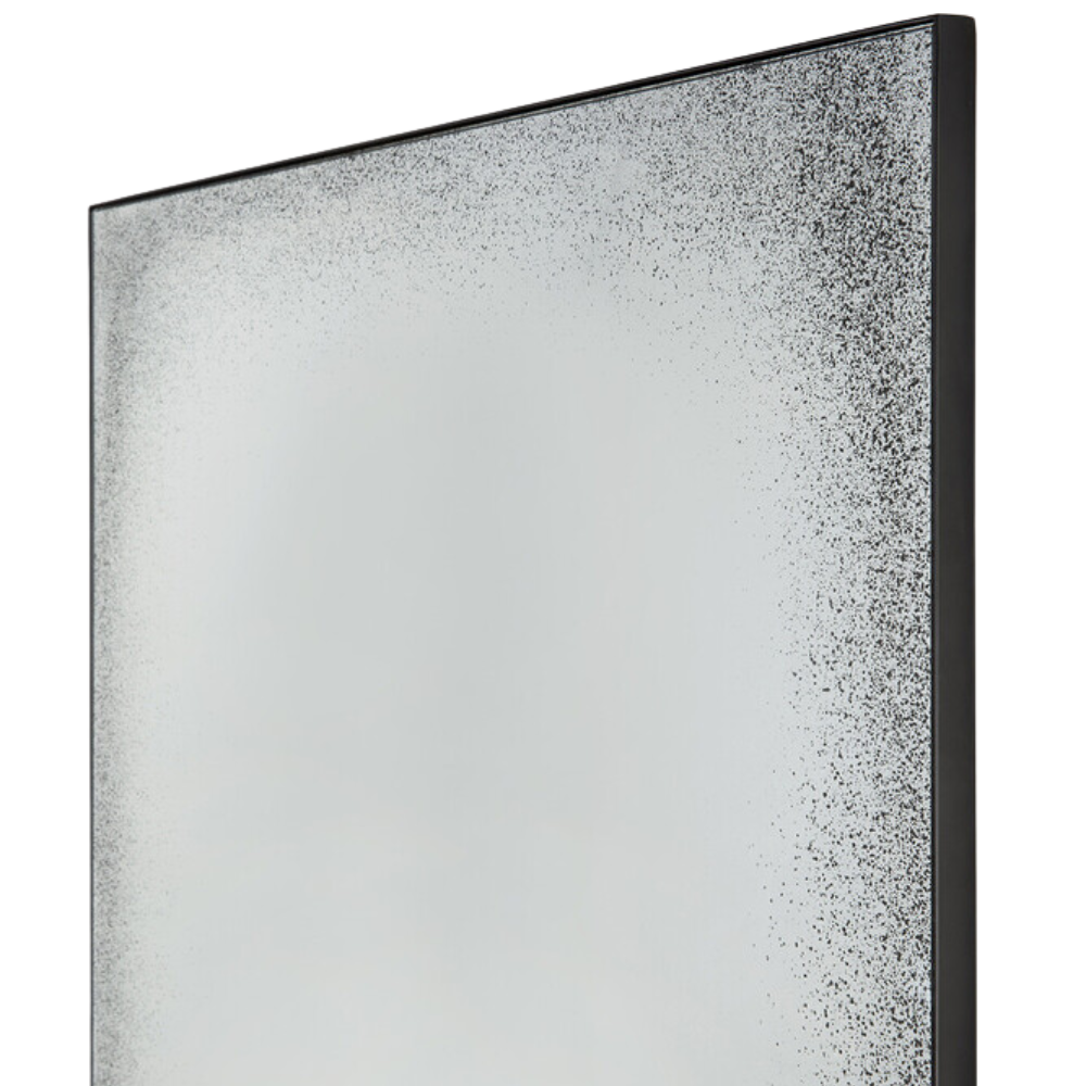 The Aged Wall Mirror Rectangle, clear from Ethnicraft, with a close-up from the side angle.