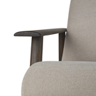 The Aspekt Lounge Chair by Ethnicraft focusing on the armrest.