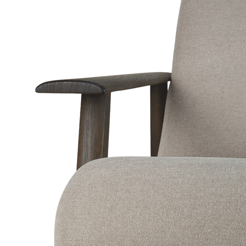 The Aspekt Lounge Chair by Ethnicraft focusing on the armrest.