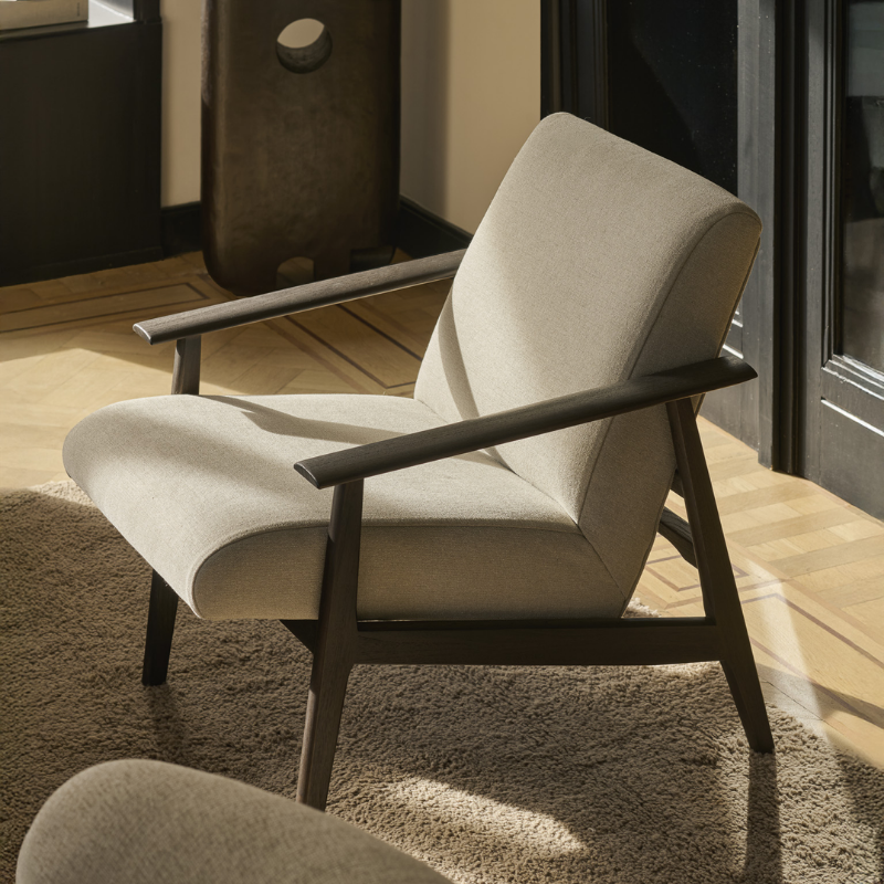 The Aspekt Lounge Chair from Ethnicraft in a living room.