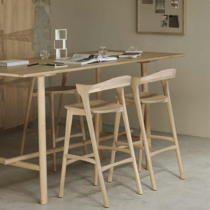 The Bok Bar Stool by Ethnicraft in a living room.