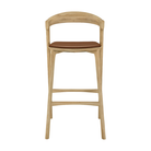 The Bok Upholstered Bar Stool by Ethnicraft from the front.