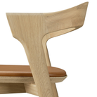 The Bok Upholstered Counter Stool from Ethnicraft with the backrest close-up.