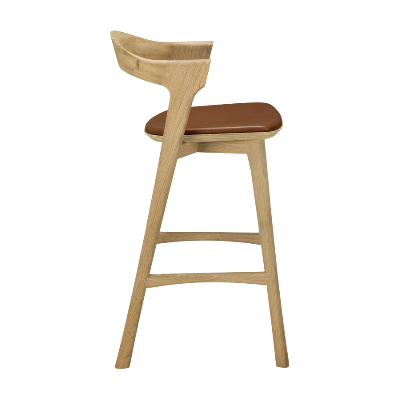 The Bok Upholstered Counter Stool from Ethnicraft from the side angle.