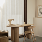 The Boomerang Desk Oak by Ethnicraft in the Study room.