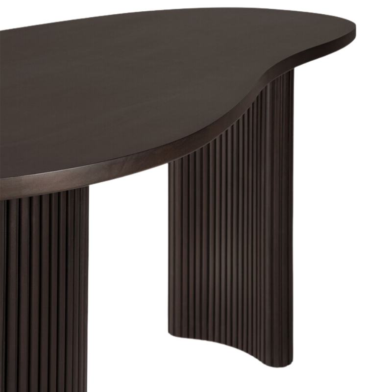 The Boomerang Desk by Ethnicraft, mahogany with the tabletop and leg detail. all-groups