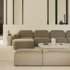 The Bulky Footstool from Ethnicraft in a living room.