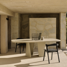 The Canyon Outdoor Dining Table from Ethnicraft in an outdoor dining area.