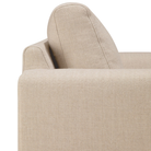 The Ease Lounge Chair by Ethnicraft from the armrest with cushion close-up.