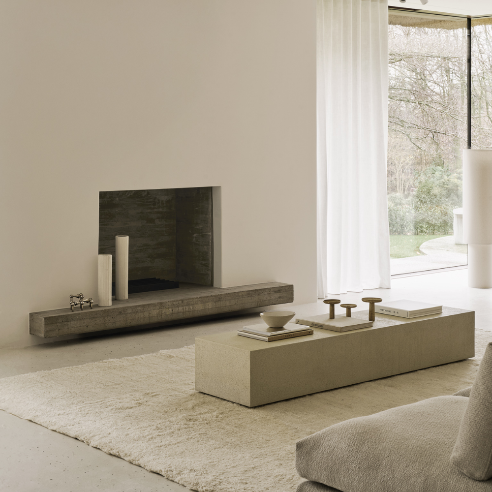 The Elements Floor Shelf from Ethnicraft in a living room.