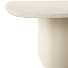 The Elements Pebble Dining Table by Ethnicraft from the top and leg in detail.