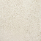 The Elements Pebble Dining Table by Ethnicraft detailed image of the microcement texture.