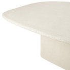 The Elements Pebble Dining Table by Ethnicraft from the side angle.