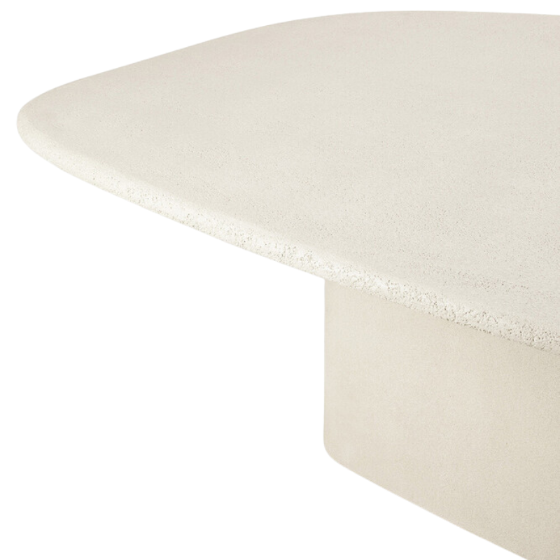 The Elements Pebble Dining Table by Ethnicraft from the side angle.