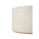 The 32 inch Elements Round Coffee Table from Ethnicraft focusing on the edge.