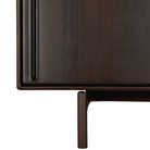 The 66-inch Flow Sideboard by Ethnicraft from a leg close-up. all-groups