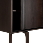 The 66-inch Flow sideboard by Ethnicraft with an open door. all-groups