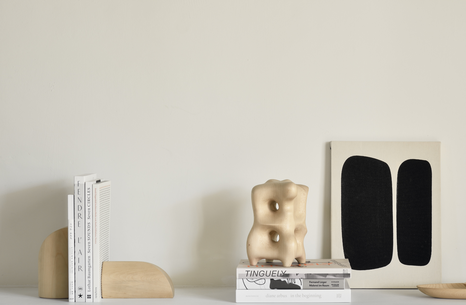 Modern home decor like sculptures and bookends by Ethnicraft on sale at Illuminée.