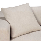 The Mellow Cushion from Ethnicraft in off white on a sofa.