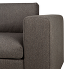 The Mellow Sofa in Granite from Ethnicraft with a close-up of the armrest.