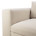 The Mellow Sofa Set Square 1-3 Off White Left from Ethnicraft with a close-up of the armrest.