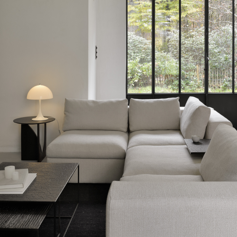 The Mellow Sectional Sofa in Off White from Ethnicraft in a living room.