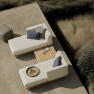 The Monocle Outdoor Modular Sofa from Ethnicraft in an outdoor family area. all-groups