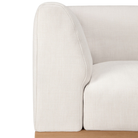 The Monocle Outdoor Modular Sofa Set I Right from Ethnicraft with a wooden base and armrest.