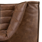 The N701 Leather Corner Chestnut by  Ethnicraft from the side angle.