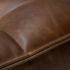 The N701 Leather One Seater Chestnut by Ethnicraft with the details of the seat.