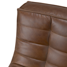 The N701 Leather Two Seater Sofa Chestnut by Ethnicraft with a close-up of the backrest from the top.
