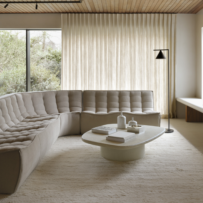 The N701 Modular Round Corner Sofa 1-2 from Ethnicraft in ecru eco fabric in a living room. all-groups