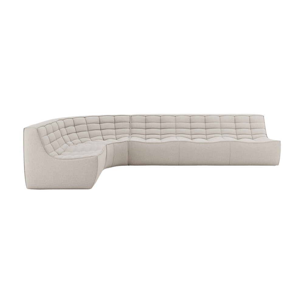 The left lounger N701 Modular Round Corner Sofa 1-3 from Ethnicraft with beige standard fabric.