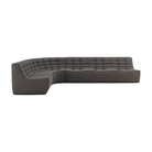 The left lounger N701 Modular Round Corner Sofa 1-3 from Ethnicraft with dark gray standard fabric.