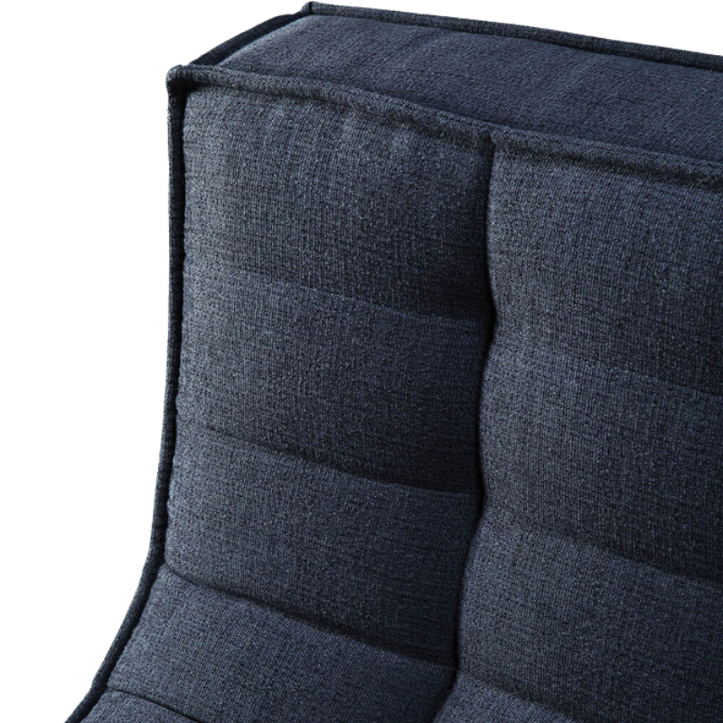 The N701 Modular Round Corner Sofa 2-3 from Ethnicraft in graphite eco fabric top edge close-up. all-groups