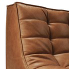 The N701 Modular Round Corner Sofa 2-3 Old Saddle from Ethnicraft with a close-up of the backrest. all-groups