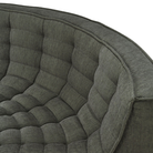 The N701 Modular Round Corner Sofa from Ethnicraft with moss eco fabric highlighting the round corner.