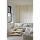 The N701 Modular Sectional Sofa, Square 1-2 from Ethnicraft in beige standard fabric in a living room.