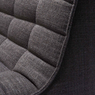 The N701 Modular Sectional Sofa, Square 1-2 from Ethnicraft in dark gray standard fabric close up.