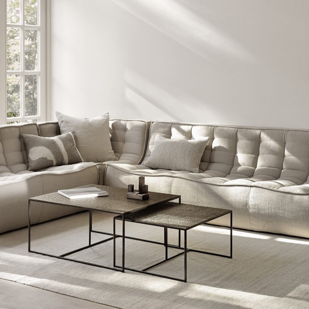 The N701 Modular Sofa from Ethnicraft with beige standard fabric in a living room.