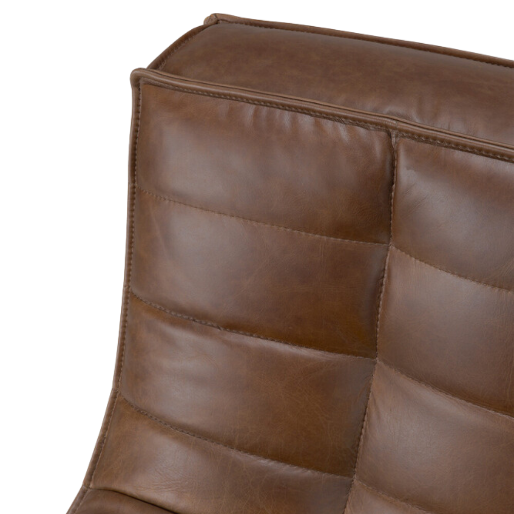 The N701 Modular Sofa from Ethnicraft with chestnut aniline leather in detail showing the stitching.