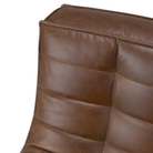 The N701 Modular Sofa from Ethnicraft with chestnut aniline leather in detail showing the stitching.